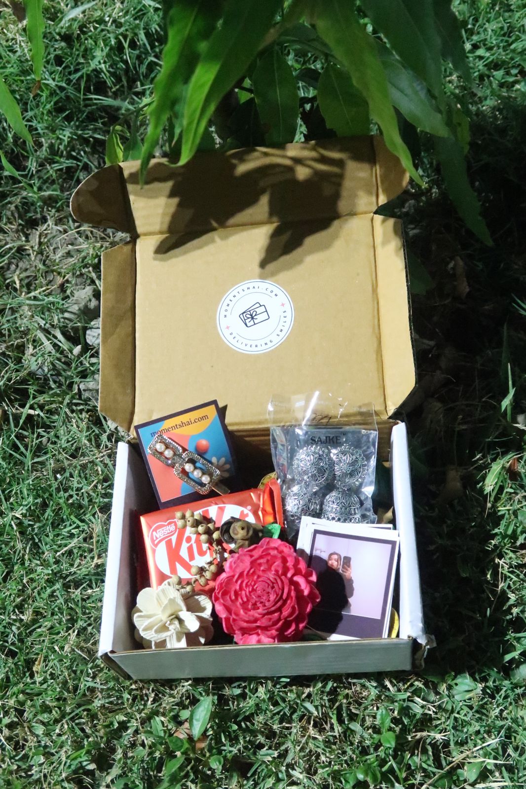Sweet Moments Gift Hamper for Her – Jhumka, Polaroid, KitKat & More