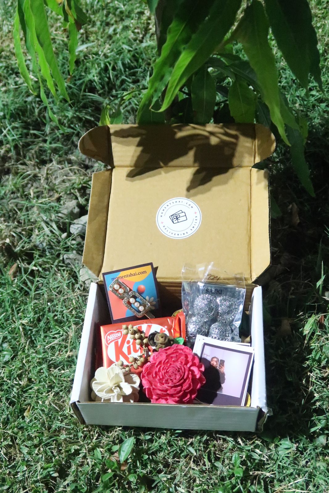 Sweet Moments Gift Hamper for Her – Jhumka, Polaroid, KitKat & More